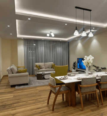 Modern living room and dining area showcasing a successful, organized residential move